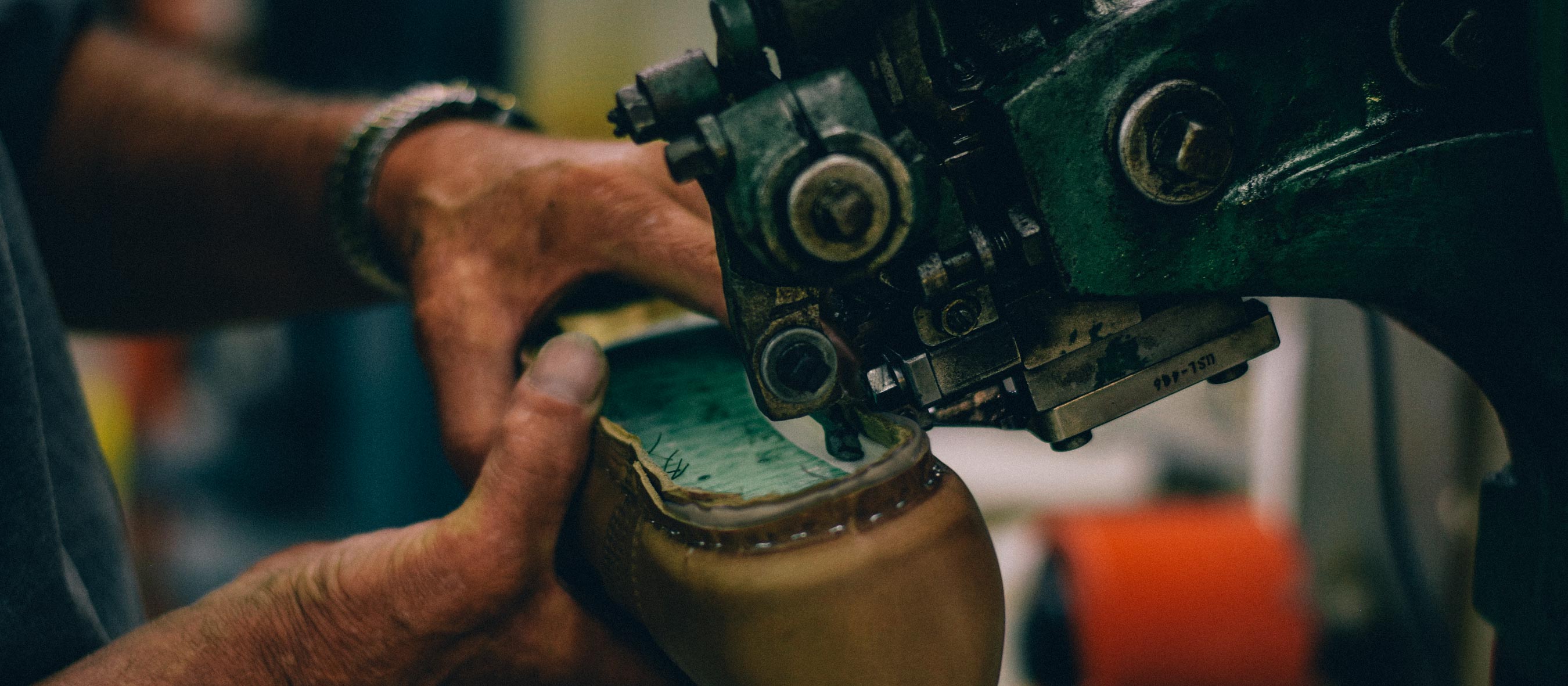 The upper of a Trench Boot being attached to its midsole